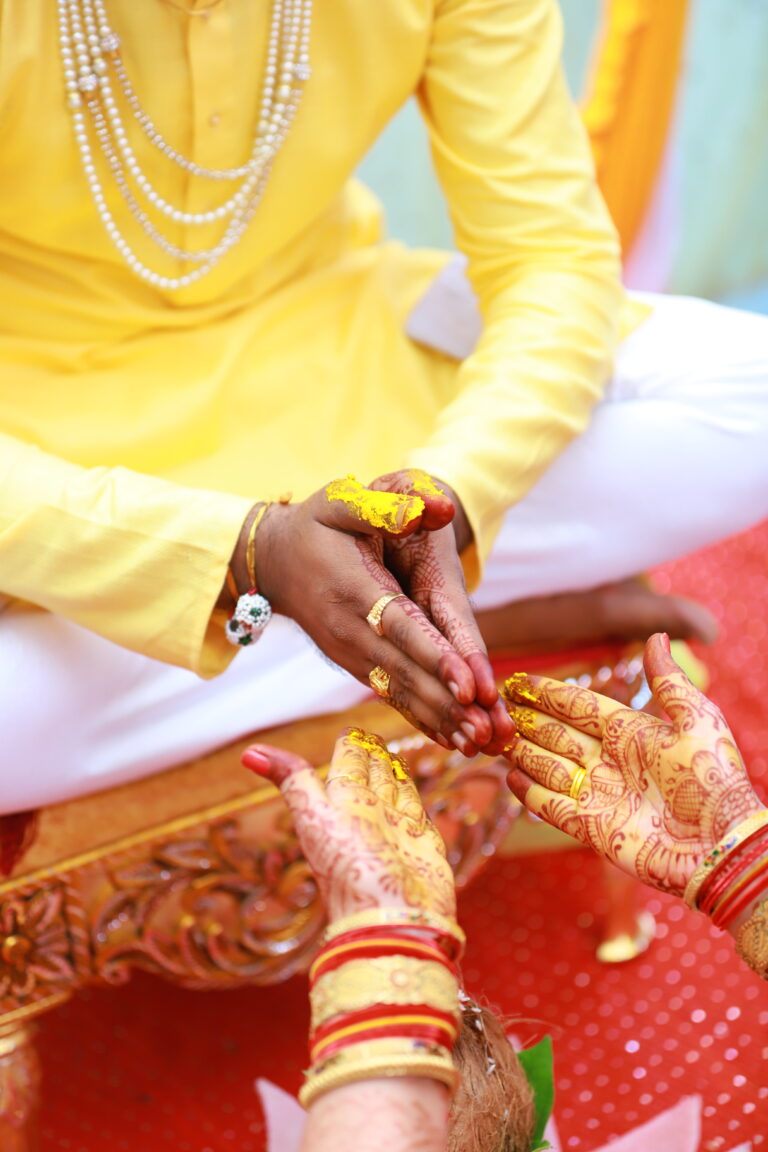 indian-wedding-groom-hands-haldi-ceremony